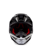 Alpinestars Supertech M10 Ampress hjelm, motocross-hjelm, sort og hvid mat, set forfra med rødt indvendigt for, aerodynamisk skal med ventilationsporte og Alpinestars-logo