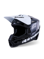 Alpinestars S-M3 Radium hjelm, motocross-hjelm, sort, hvid og grå blank finish, med hvidt visir med sort branding, blank sort skal med fremtrædende hvide Alpinestars-logoer og grå grafikdetaljer, aerodynamisk design til off-road racing