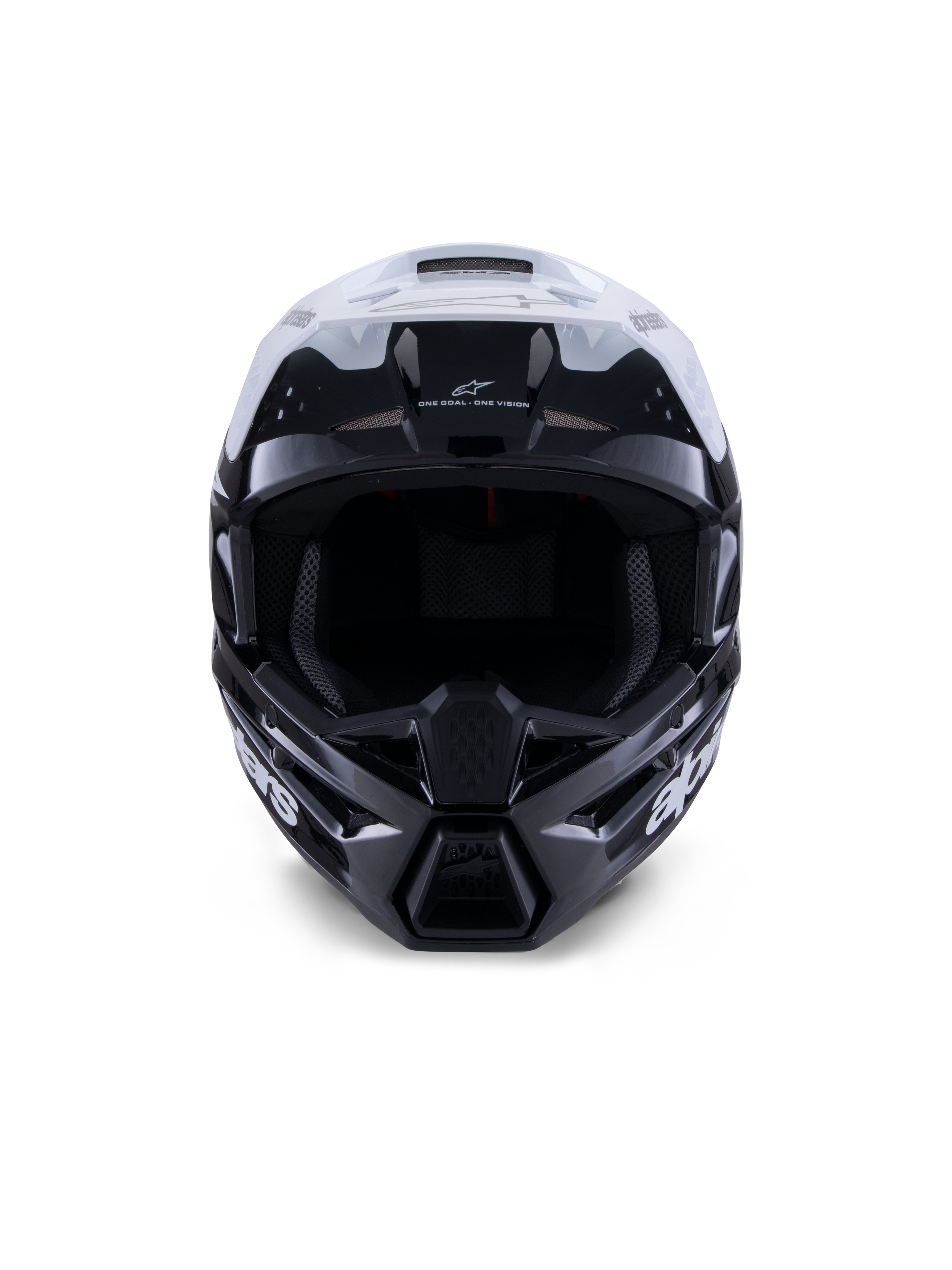 Alpinestars S-M3 Radium hjelm, motocrosshjelm, blank sort, hvid og grå, set forfra, med et aggressivt skaldesign, hvidt visir, sort hagebeskytter og netforede ventilationsåbninger.