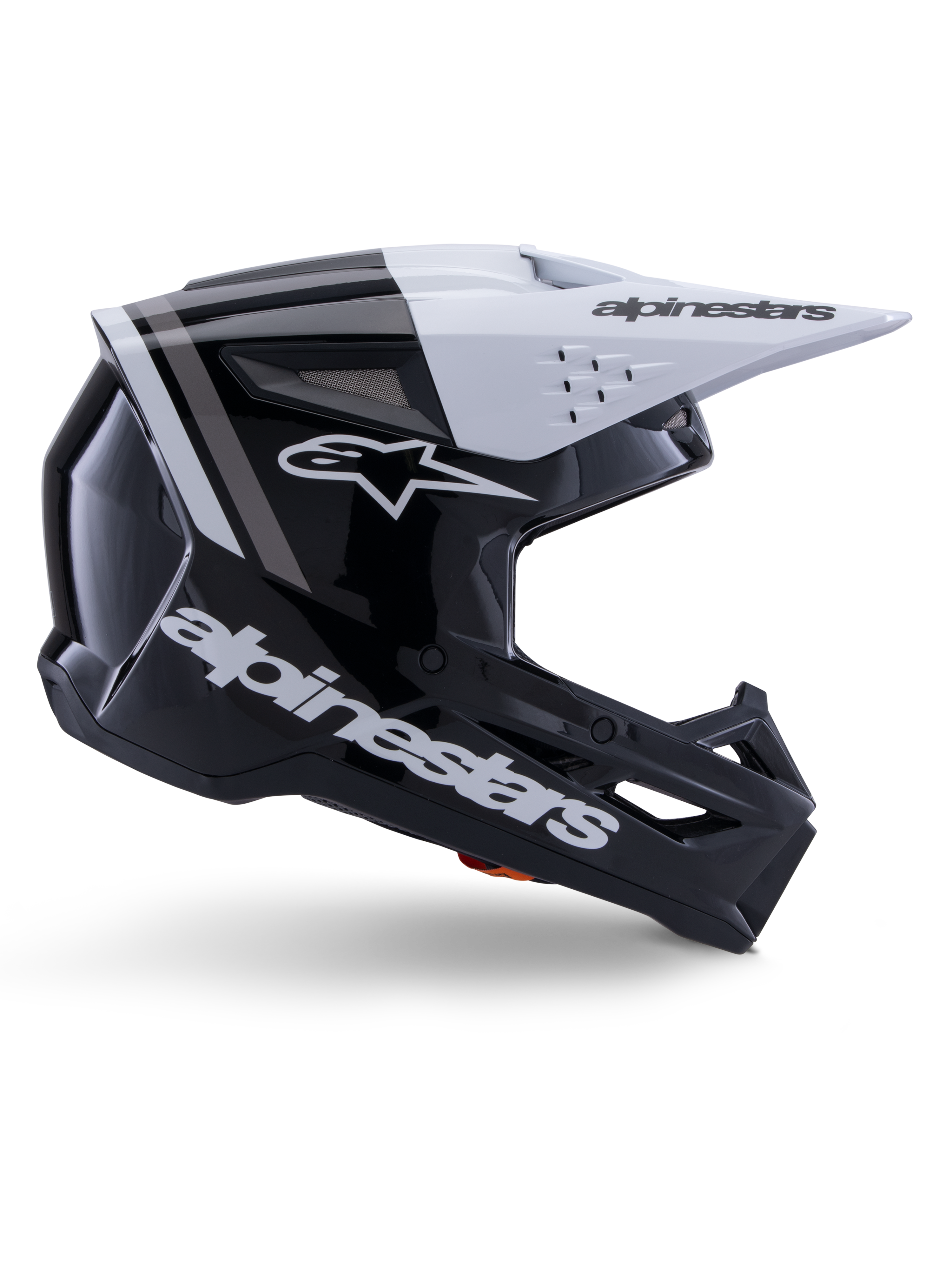 Alpinestars S-M3 Radium hjelm, motocross off-road hjelm, sort, hvid og grå blank, med et kantet aerodynamisk design og ventilationsåbninger, set fra siden, blank finish med grå striber og et hvidt visir med Alpinestars-branding