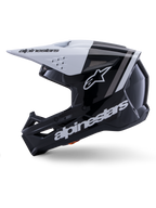 Alpinestars S-M3 Radium hjelm ECE 22.06, sideprofil, blank sort og hvid finish, grå racerstriber, hvidt Alpinestars-logo på siden og hageområdet, ventileret design til motocross og enduro