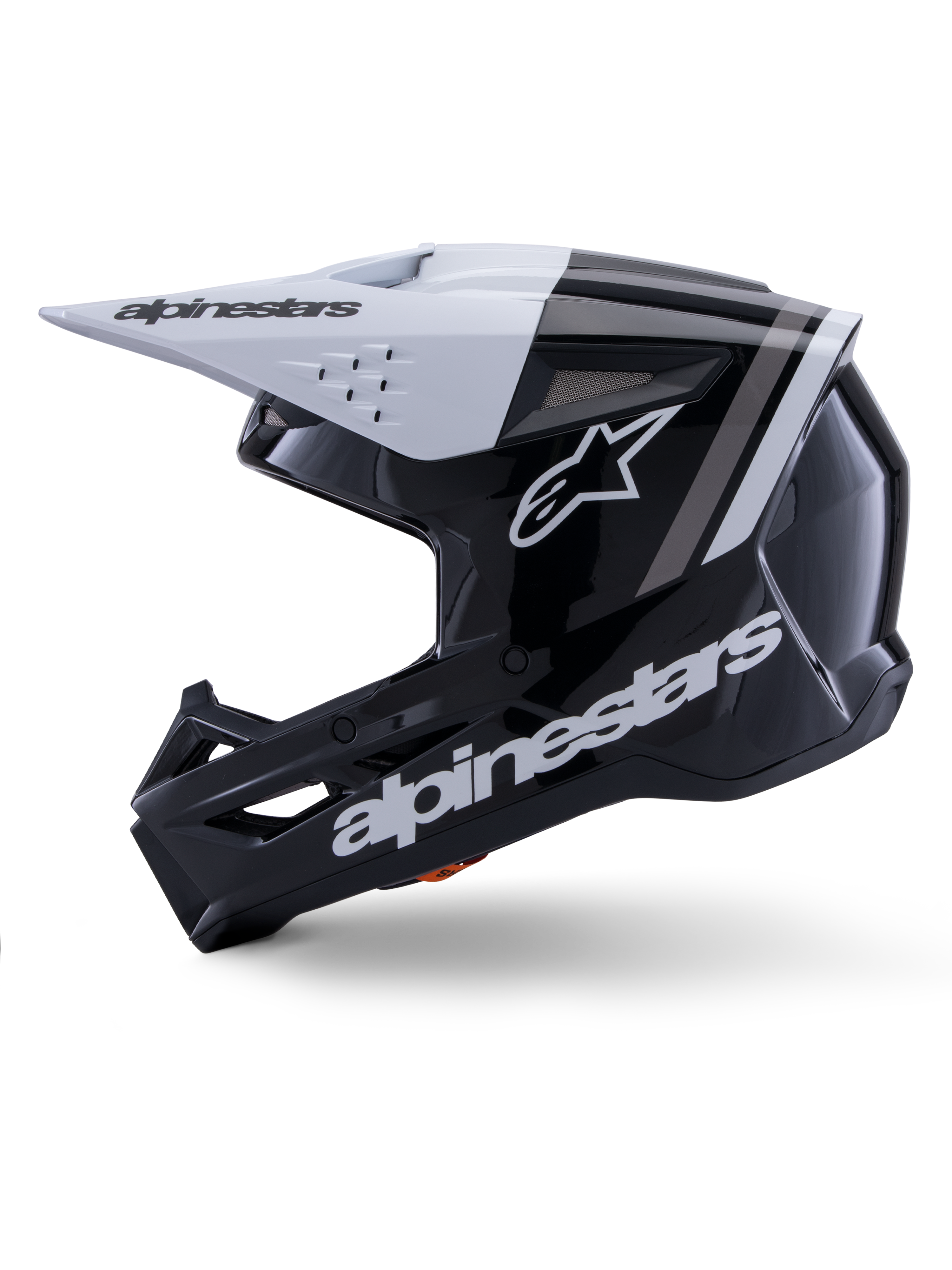 Alpinestars S-M3 Radium hjelm ECE 22.06, sideprofil, blank sort og hvid finish, grå racerstriber, hvidt Alpinestars-logo på siden og hageområdet, ventileret design til motocross og enduro