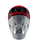 Alpinestars Supertech M10 Flood ECE 22.06 Helmet, Motocross Helmet, Silver and Black with Fluorescent Orange, top-down view showing bold branding across the crown, black Astars logo on the visor, streamlined aerodynamic profile with ventilation ports, matte and glossy textures.
