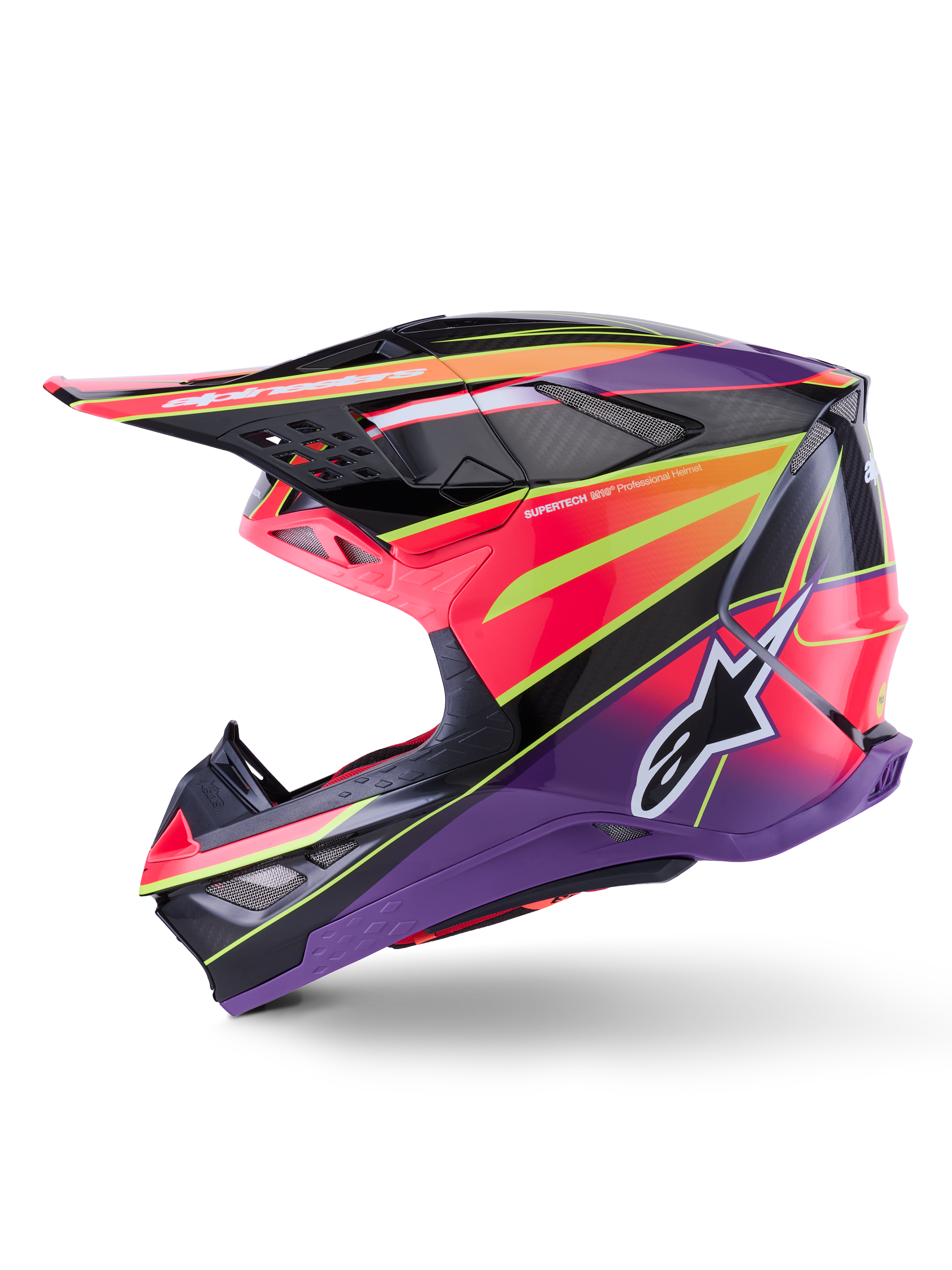 Alpinestars Supertech M10 Era hjelm, motocross-hjelm, pink, violet og fluorescerende gul blank, sideprofil der viser markante geometriske grafikker og kulfibertekstur, med Alpinestars stjerne-logo, integrerede ventilationsporte og et strømlinet aerodynamisk design til off-road kørsel