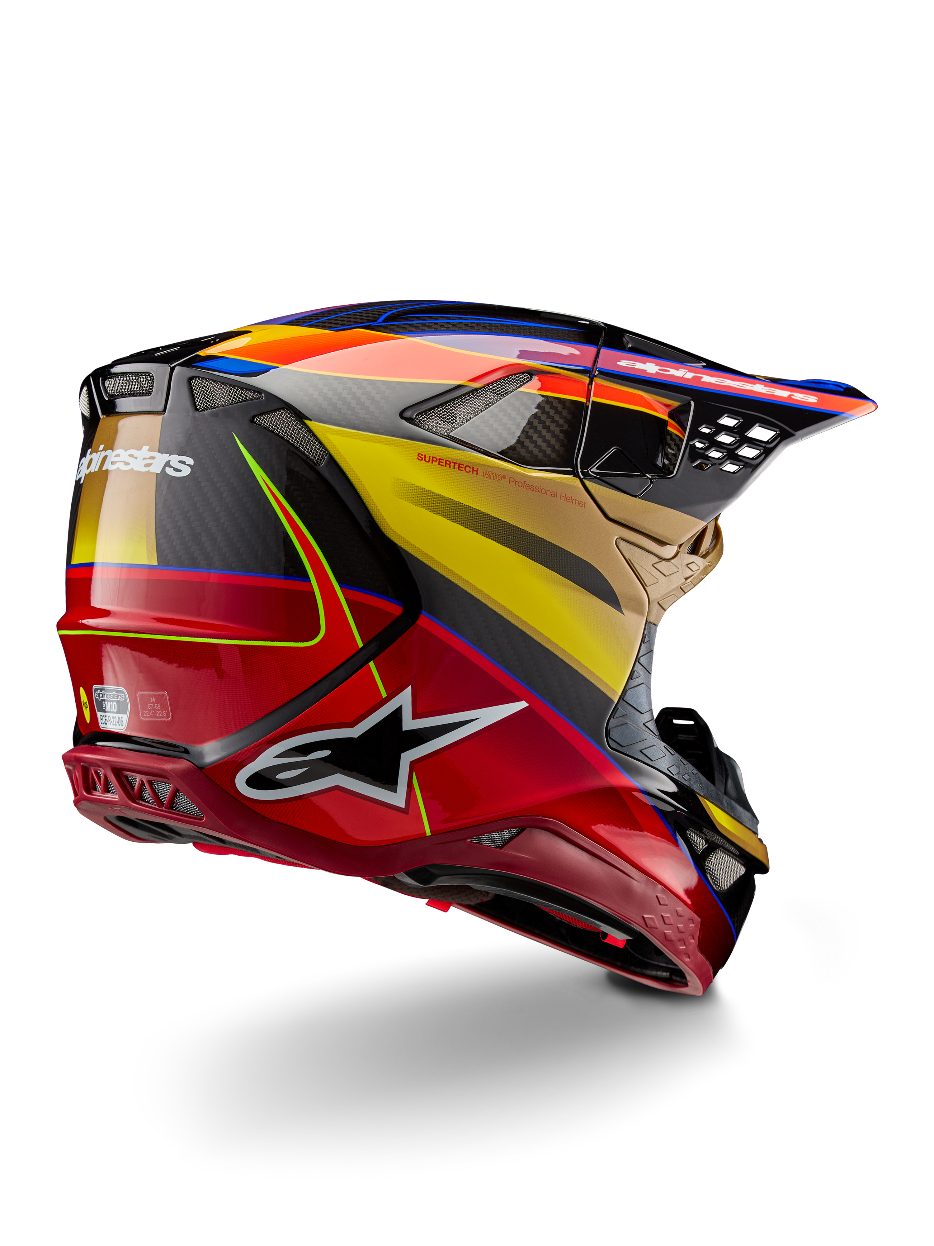 Alpinestars Supertech M10 Era Helmet, Motocross Helmet, Gold Yellow Rio Red Glossy, rear three-quarter view showing carbon fiber shell with red and yellow graphics, blue accents, aerodynamic profile with multiple ventilation ports and bold Astar logo.