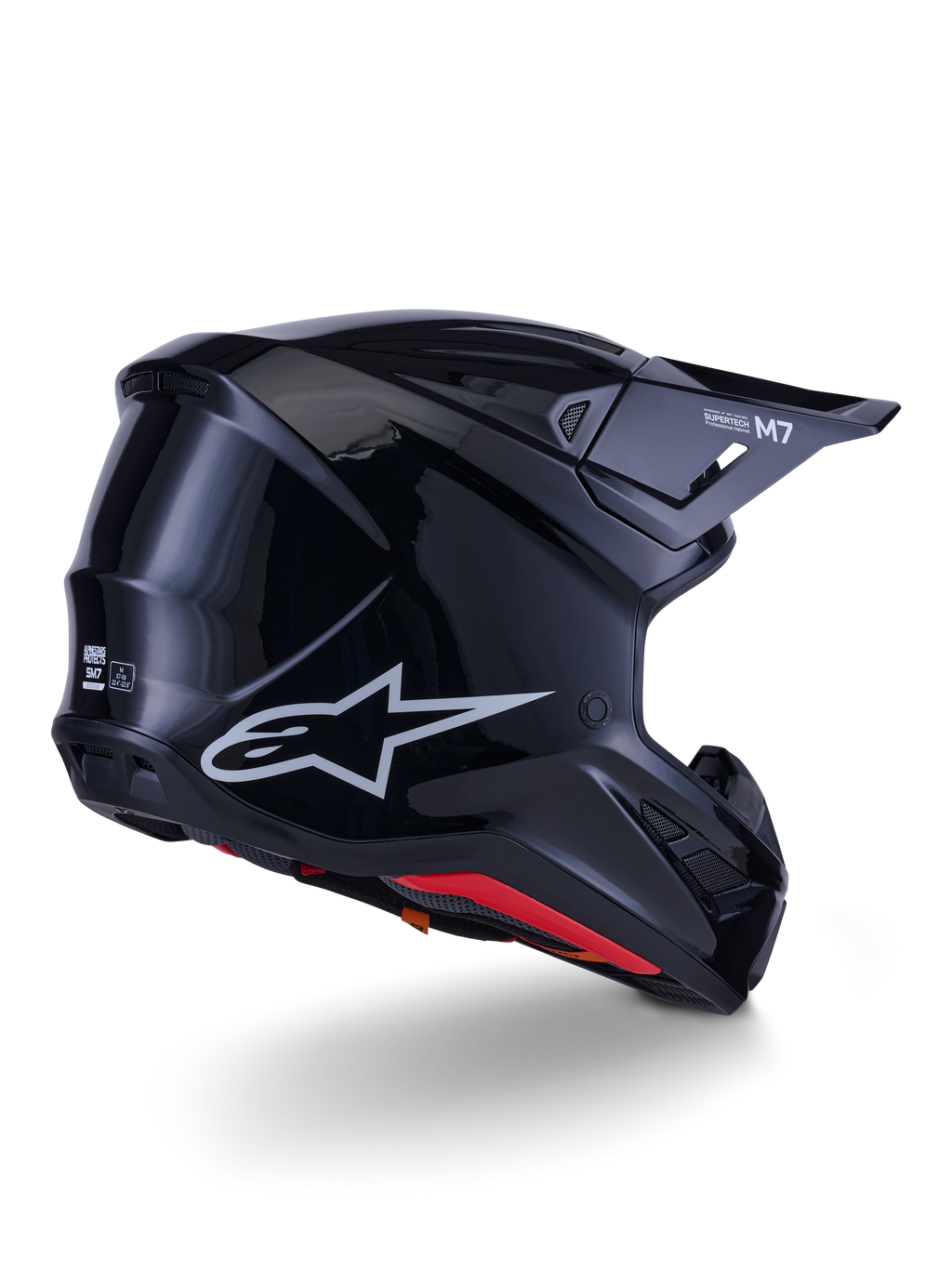 Alpinestars S-M7 Solid hjelm, motocross-hjelm, blank sort, med en strømlinet aerodynamisk skal, sølvfarvet Astars-logo, rød indvendig kant og integrerede ventilationsporte, designet til beskyttelse ved off-road racing