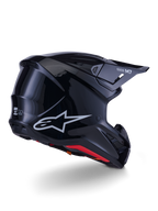 Alpinestars S-M7 Solid hjelm, motocross-hjelm, blank sort, med en strømlinet aerodynamisk skal, sølvfarvet Astars-logo, rød indvendig kant og integrerede ventilationsporte, designet til beskyttelse ved off-road racing