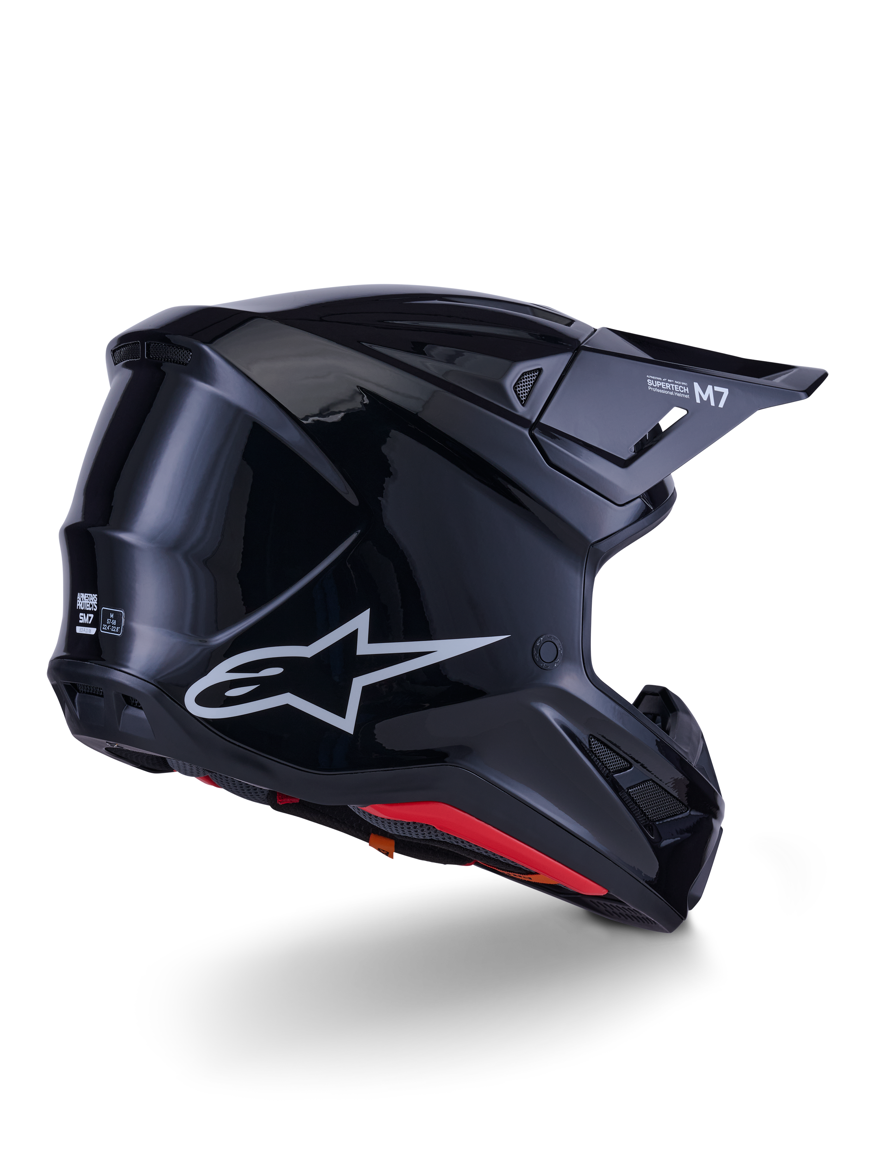 Alpinestars S-M7 Solid hjelm, motocross-hjelm, blank sort, med en strømlinet aerodynamisk skal, sølvfarvet Astars-logo, rød indvendig kant og integrerede ventilationsporte, designet til beskyttelse ved off-road racing
