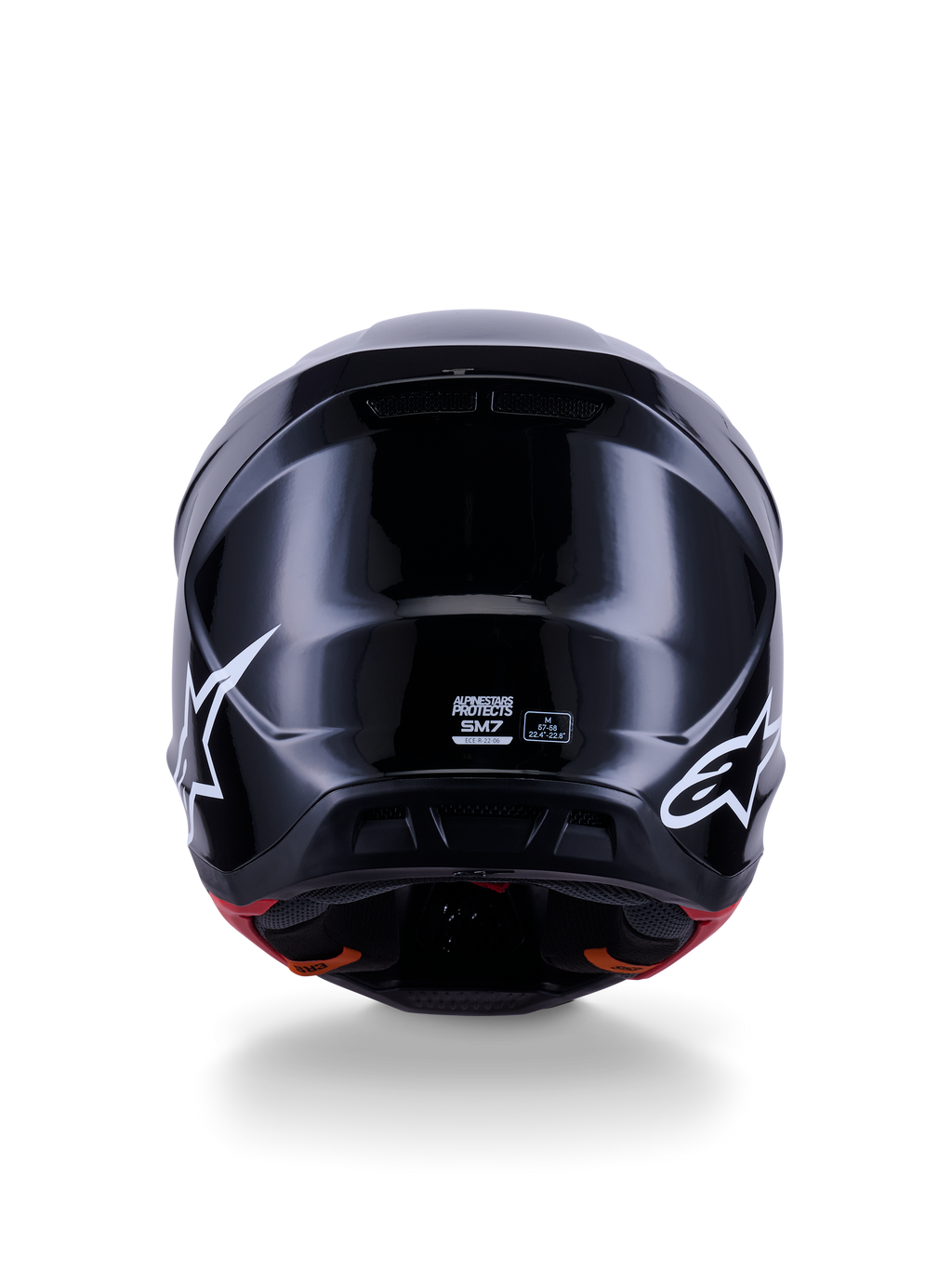 Alpinestars S-M7 Solid hjelm ECE 22.06, motocrosshjelm, blank sort, set bagfra med hvide stjernelogoer, aerodynamisk kompositskal med en højglansfinish, sikkerhedscertificering og størrelseslabels i midten