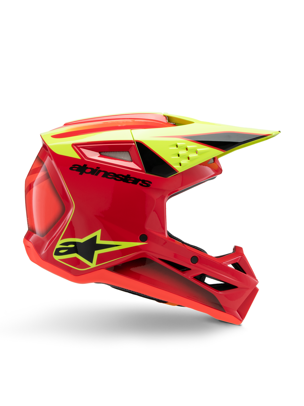 Alpinestars S-M3 Youth Fray-hjelm, motocross-hjelm, rød, fluorescerende gul og blank sort, profilvisning fra siden, der viser et strømlinet aerodynamisk design med integreret visir og markante ventilationsåbninger, markant sort branding på en iøjnefaldende rød skal, optimeret til off-road-performance for unge