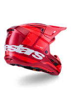 Alpinestars S-M7 Core hjelm, motocrosshjelm, blank rød med stort hvidt Alpinestars-logo på siden, med aerodynamisk skal, integrerede ventilationsporte og beskyttende visir, 3/4 visning bagfra