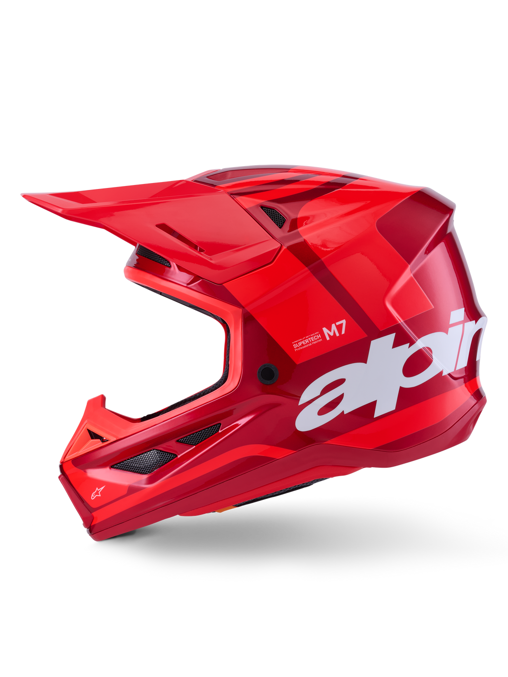 Alpinestars S-M7 Core hjelm, blank rød med geometriske accenter, motocross-hjelm, sideprofil, aerodynamisk skal med ventilationsporte og hvid branding, højtydende off-road racingudstyr