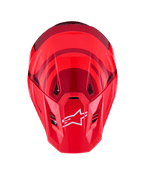 Alpinestars S-M7 Core-hjelm, Red Glossy, set oppefra med aerodynamisk skal og mørkerøde detaljer, hvidt A-star logo på visiret, integrerede ventilationsporte, højtydende motocross-beskyttelsesudstyr