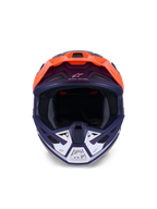 Alpinestars S-M7 Core hjelm, motocross-hjelm, orange og blå mat, set forfra med hvide detaljer på hagebeskytteren, med "One Goal - One Vision"-branding, aerodynamisk skal til off-road racing