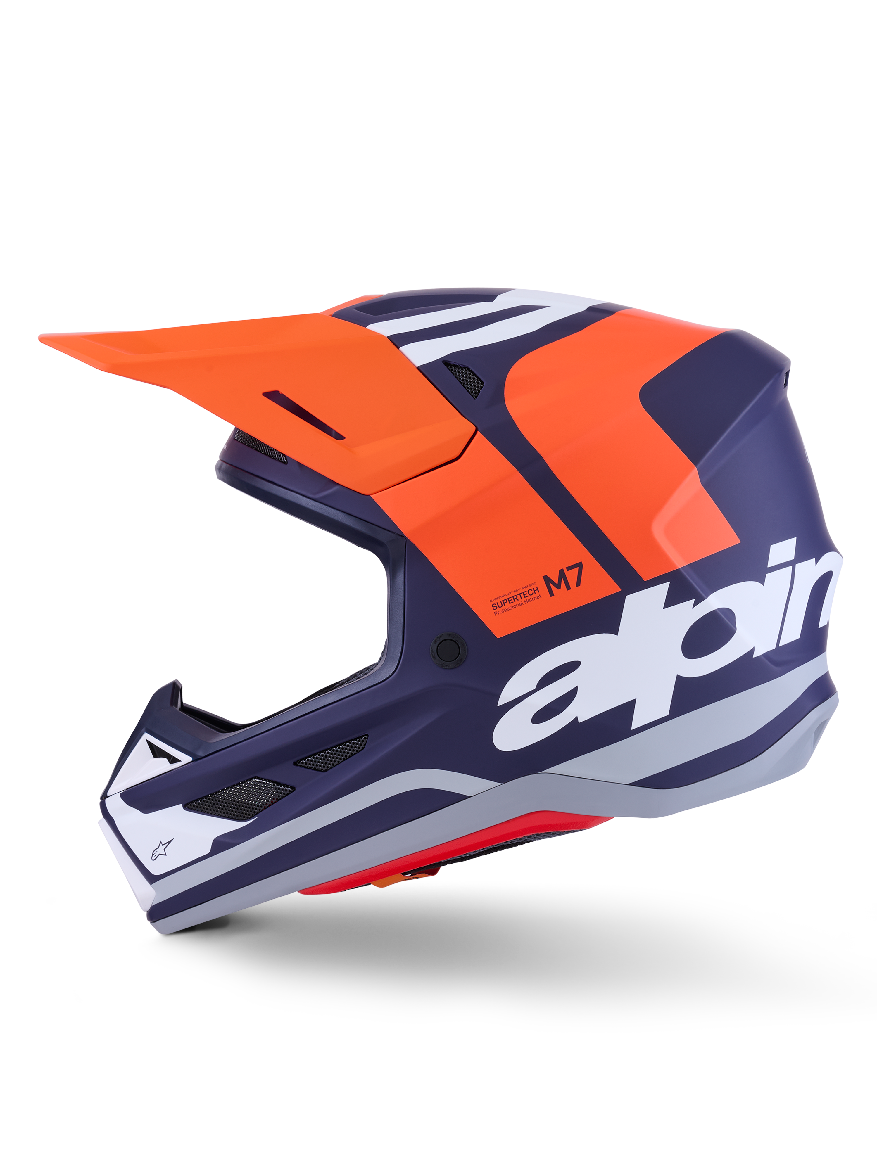 Alpinestars S-M7 Core hjelm ECE 22.06, sideprofil, navyblå og orange mat finish, stort hvidt logo på siden, aerodynamisk motocrosshjelm med beskyttende visir