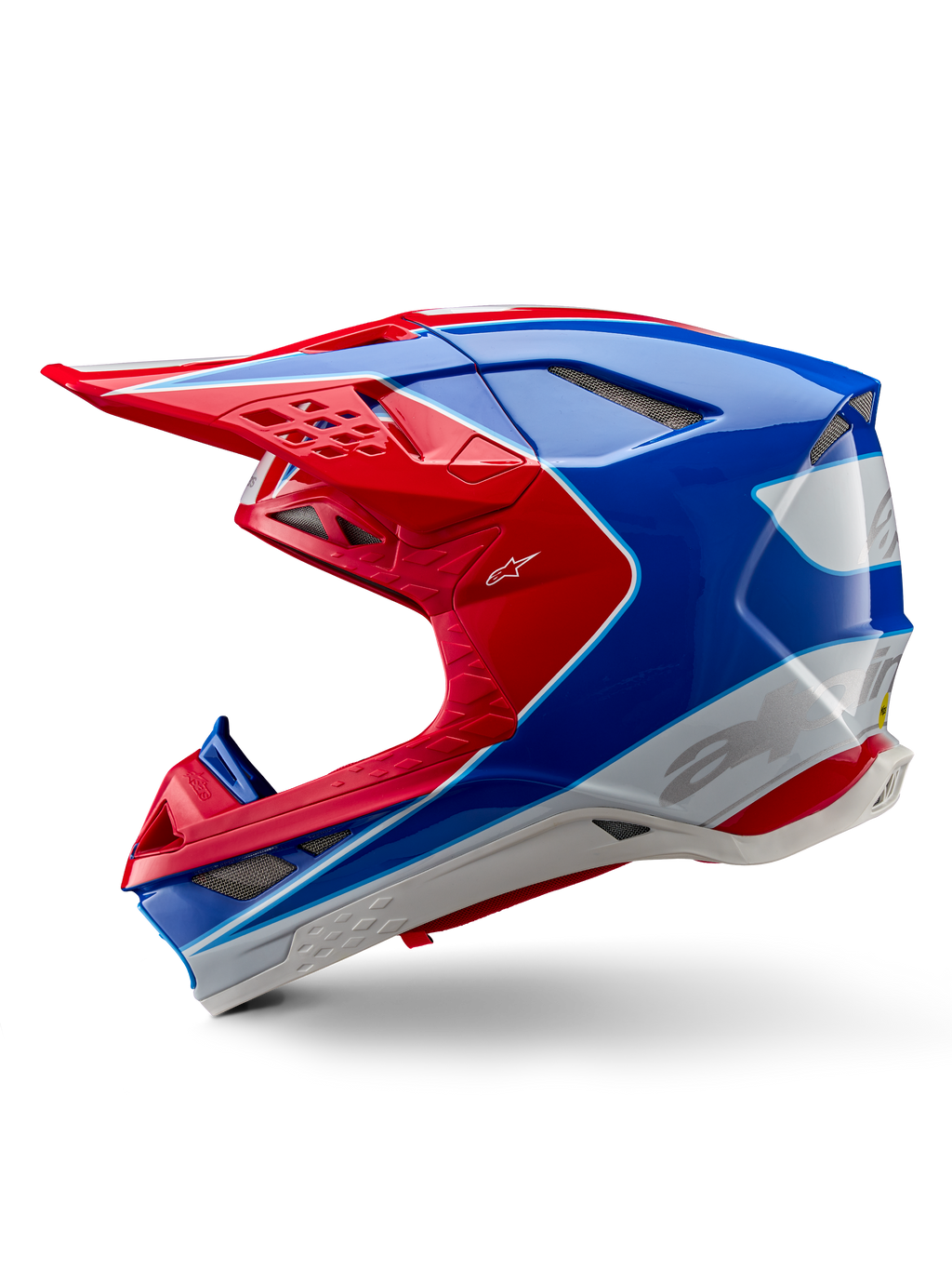 Alpinestars Supertech M10 Aeon ECE 22.06 hjelm, motocross-hjelm, klar rød og blå blank, sideprofil, aerodynamisk multi-komposit skal med integrerede ventilationsporte og rødt og blåt grafisk design, blank finish til off-road racing