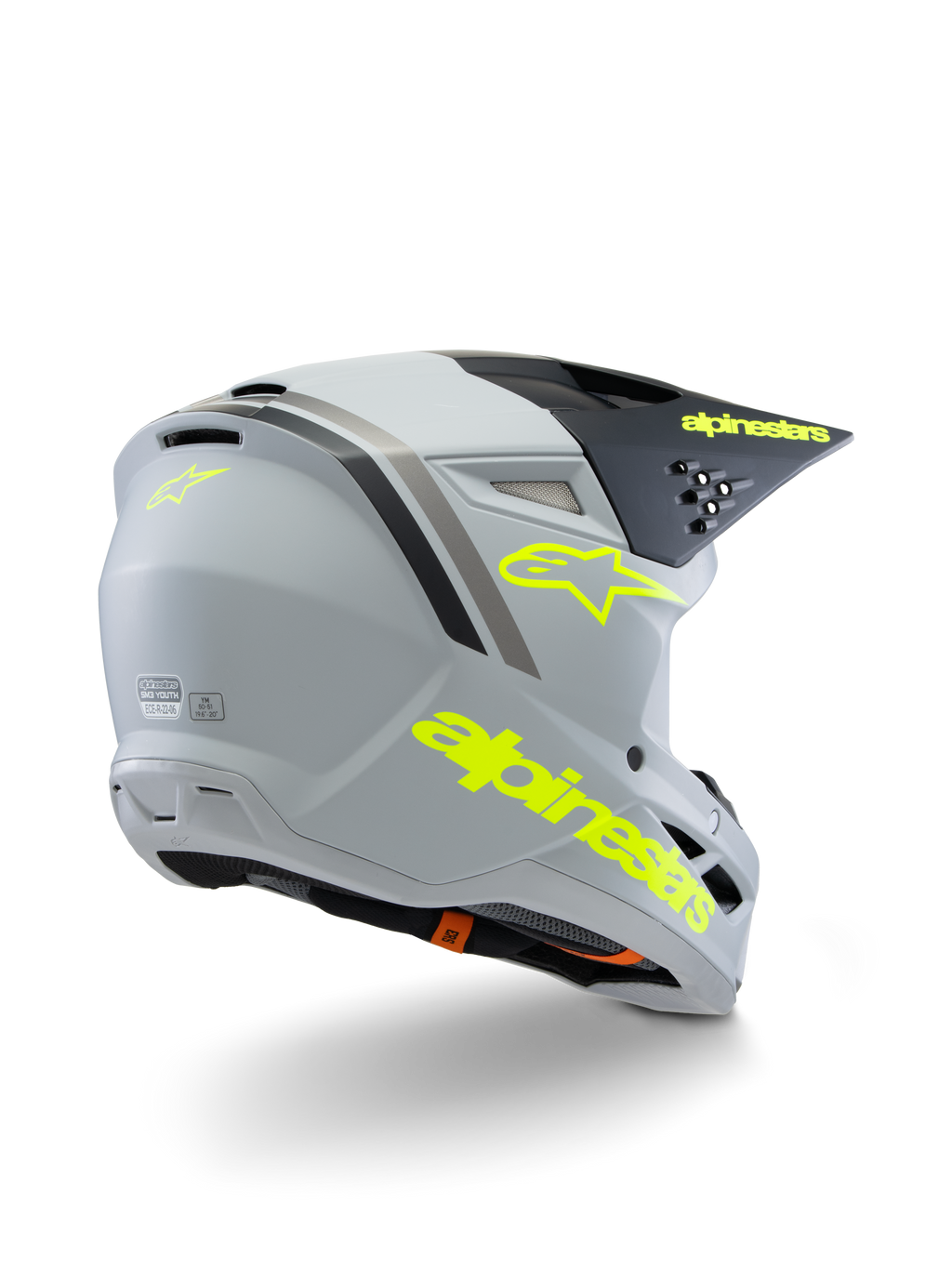 Alpinestars S-M3 Youth Radium hjelm ECE 22.06, motocrosshjelm, mat grå, sort og fluorescerende gul, set skråt bagfra med markant gul branding og stjerne-logo, strømlinet aerodynamisk skal med ventilation til terrænkørsel
