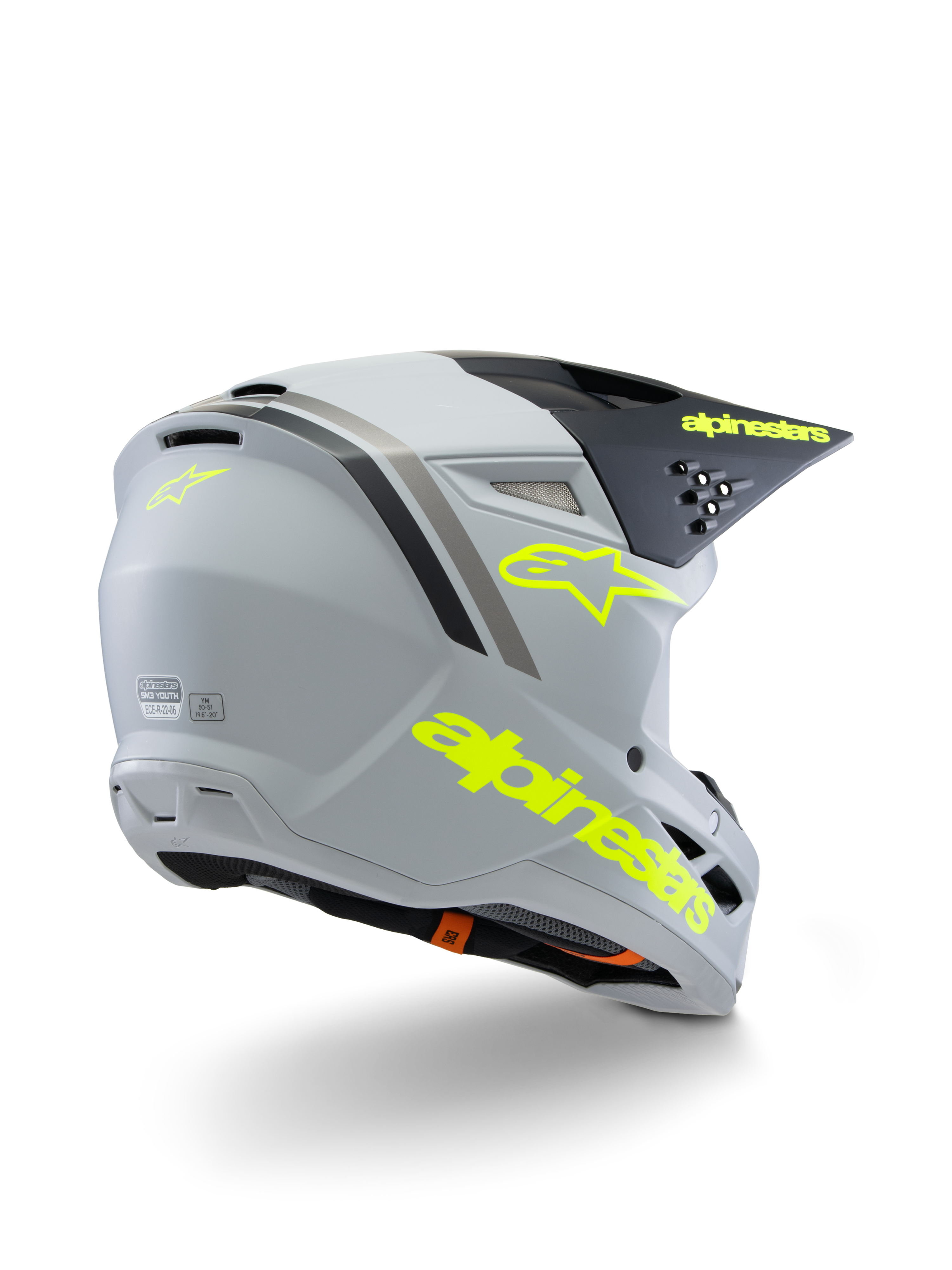 Alpinestars S-M3 Youth Radium hjelm ECE 22.06, motocrosshjelm, mat grå, sort og fluorescerende gul, set skråt bagfra med markant gul branding og stjerne-logo, strømlinet aerodynamisk skal med ventilation til terrænkørsel