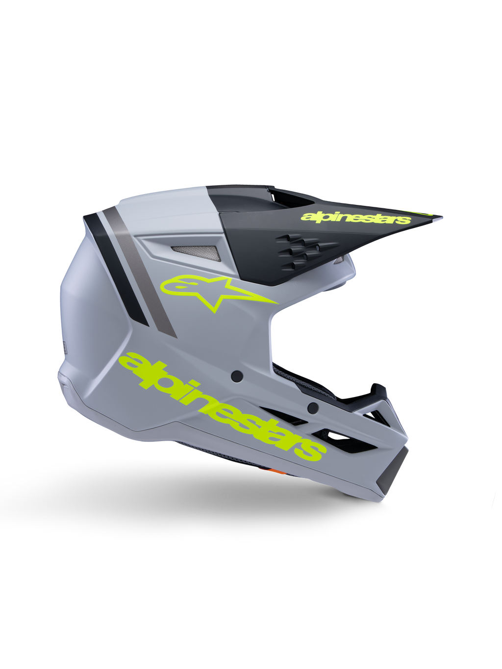 Alpinestars S-M3 Youth Radium hjelm ECE 22.06, motocross-hjelm til unge, mat grå og sort med neongul branding, sideprofil der viser Alpinestars-logo og tekst, aerodynamisk design med integreret ventilation og sort visir