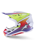 Alpinestars S-M7 Fuse hjelm, motocrosshjelm, hvid, gul fluo og blank lilla, sideprofil der viser den aerodynamiske skal med farverig gradientgrafik, sorte ventilationsåbninger og hvidt Alpinestars-logo, højtydende off-road racingudstyr.