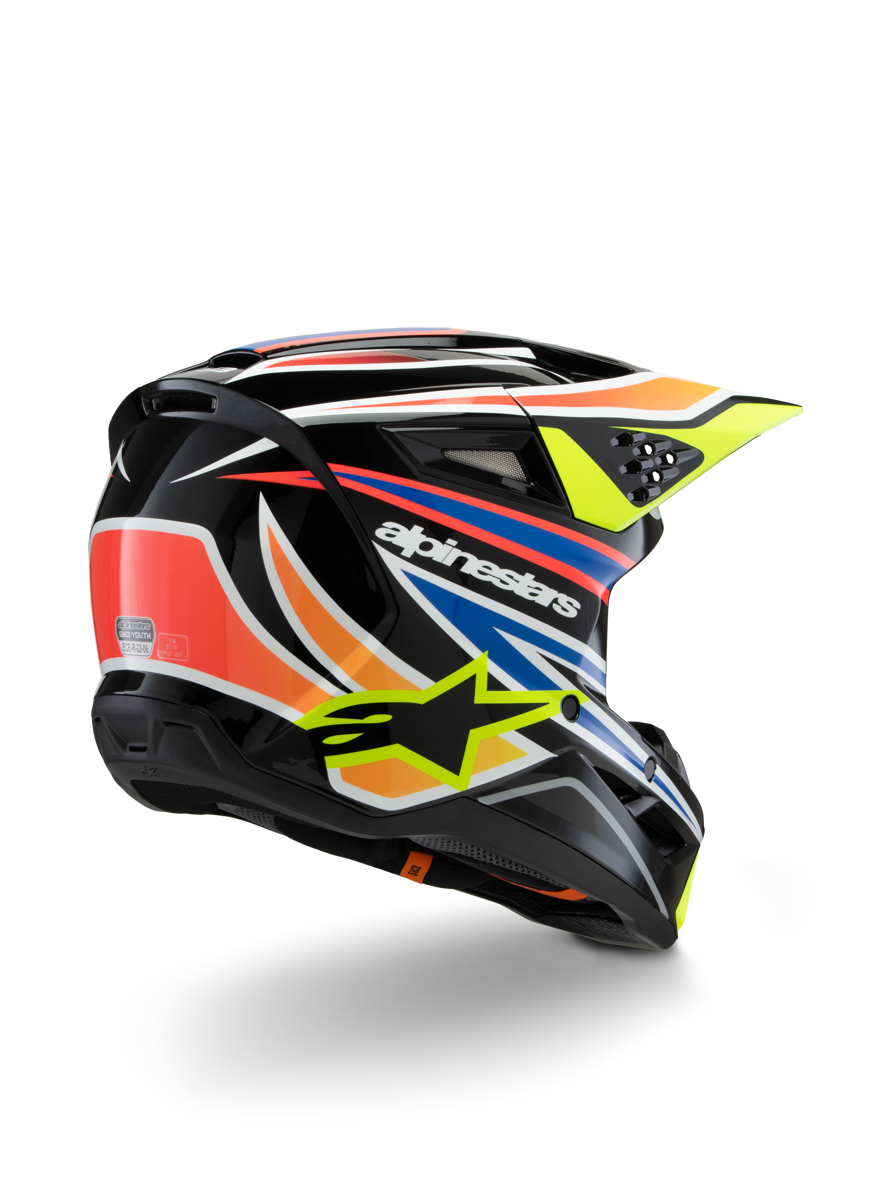 Alpinestars S-M3 Youth Wurx hjelm, motocross-hjelm til unge, sort med detaljer i livlig orange, rød, blå og fluorescerende gul, set bagfra i trekvart profil, der viser den aerodynamiske skal og ventilationsåbninger, blank finish med markant Alpinestars-branding.
