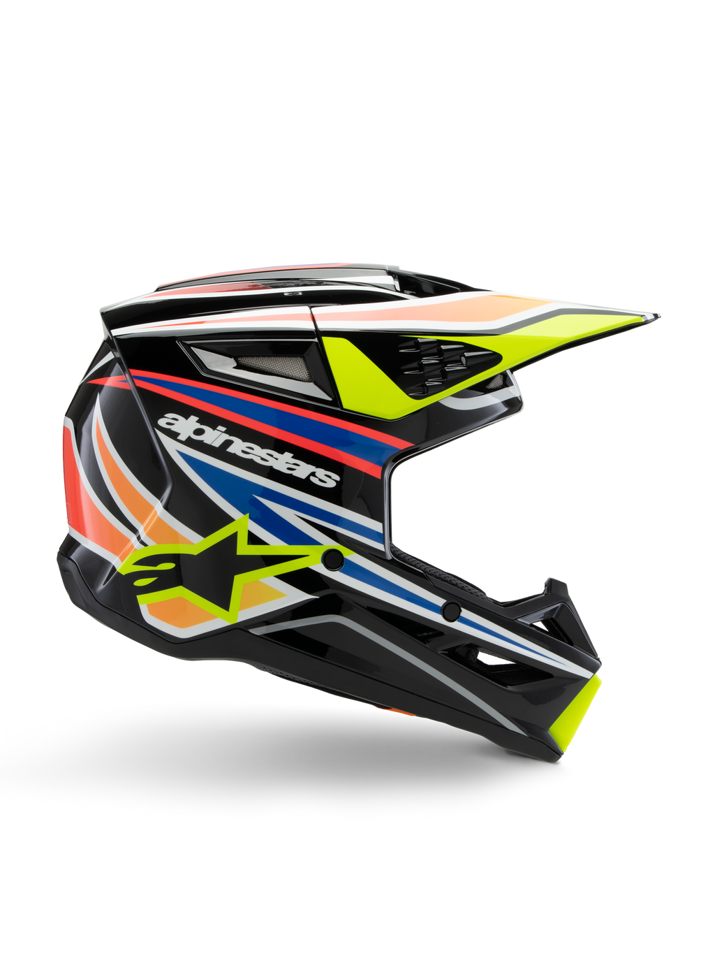 Alpinestars S-M3 Youth Wurx hjelm, motocross-ungdomshjelm, sort med gule, blå, røde og orange grafikstriber, sideprofil med aerodynamisk visir og blank finish, med hvidt Alpinestars-logo og gul stjernegrafik