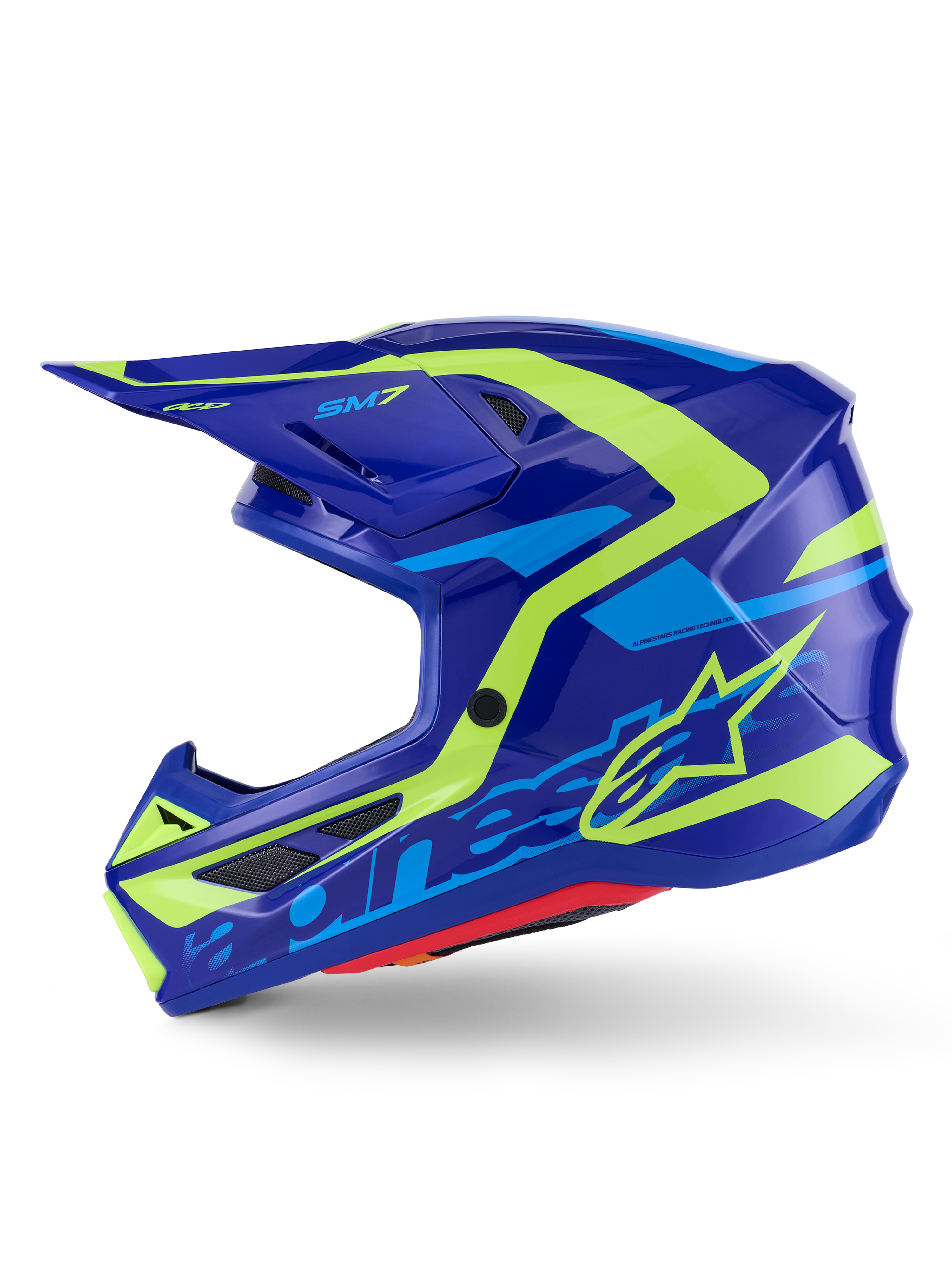 Alpinestars S-M7 Deed hjelm, motocrosshjelm, blå og fluorescerende gul blank, set fra siden, strømlinet aerodynamisk kompositskal med livlig gul og lyseblå grafik, med netdækkede ventilationsåbninger og visir til off-road-performance