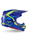 Alpinestars S-M7 Deed hjelm ECE 22.06, motocross-hjelm, blå og fluorescerende gul blank, profilvisning fra siden med en aerodynamisk skal med tydelig Alpinestars-branding, klare gule og lyseblå grafiske detaljer, flere ventilationsporte og integreret visirdesign til elite off-road racing
