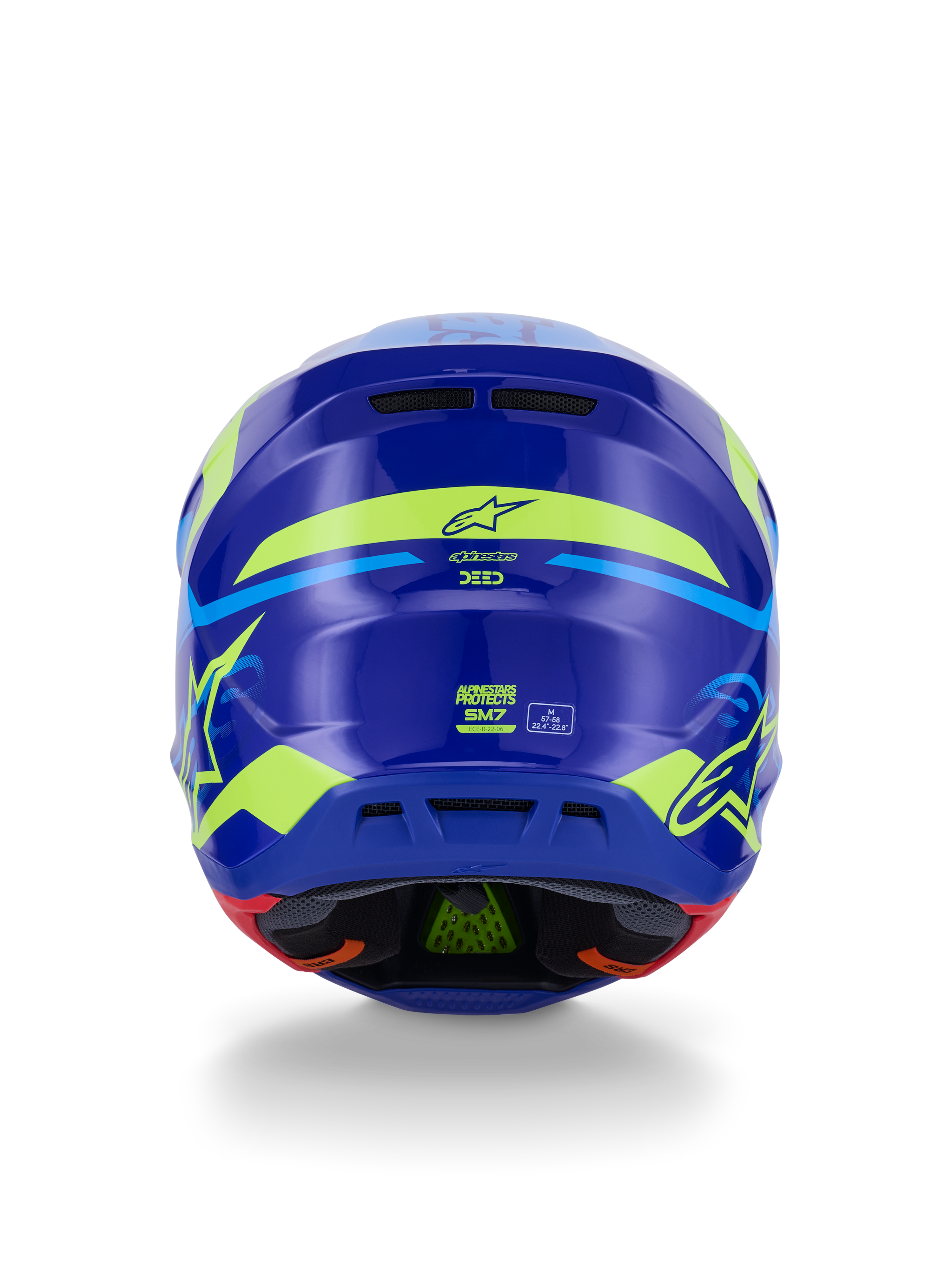 Alpinestars S-M7 Deed Hjelm ECE 22.06, motocross-hjelm, set bagfra, blå gul fluo blank, med markant fluorescerende gul grafik og stjernelogoer, bageste udluftningsporte og synlig indvendig polstring med grøn PLASMA-teknologi.