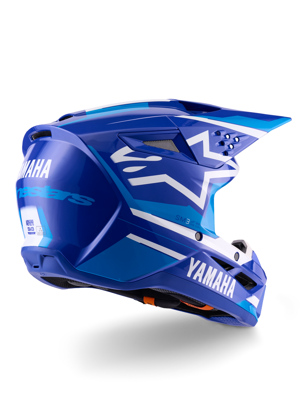 Alpinestars Yamaha S-M3 hjelm ECE 22.06, motocrosshjelm, blå og hvid blank, med Yamaha og Alpinestars branding, hvidt stjernelogo på siden, flere luftindtag og ventilationsåbninger, aerodynamisk design til off-road kørsel