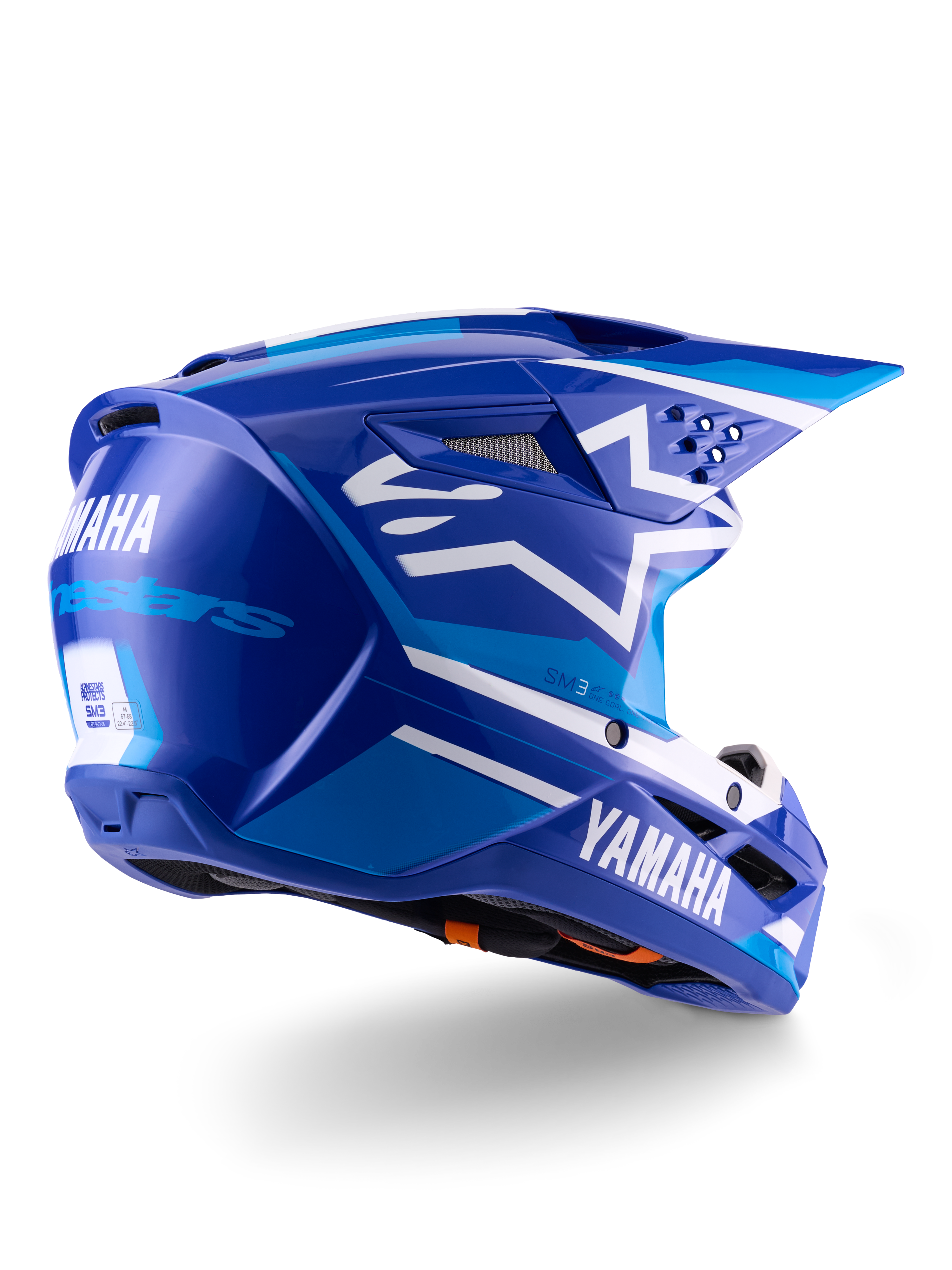 Alpinestars Yamaha S-M3 hjelm ECE 22.06, motocrosshjelm, blå og hvid blank, med Yamaha og Alpinestars branding, hvidt stjernelogo på siden, flere luftindtag og ventilationsåbninger, aerodynamisk design til off-road kørsel