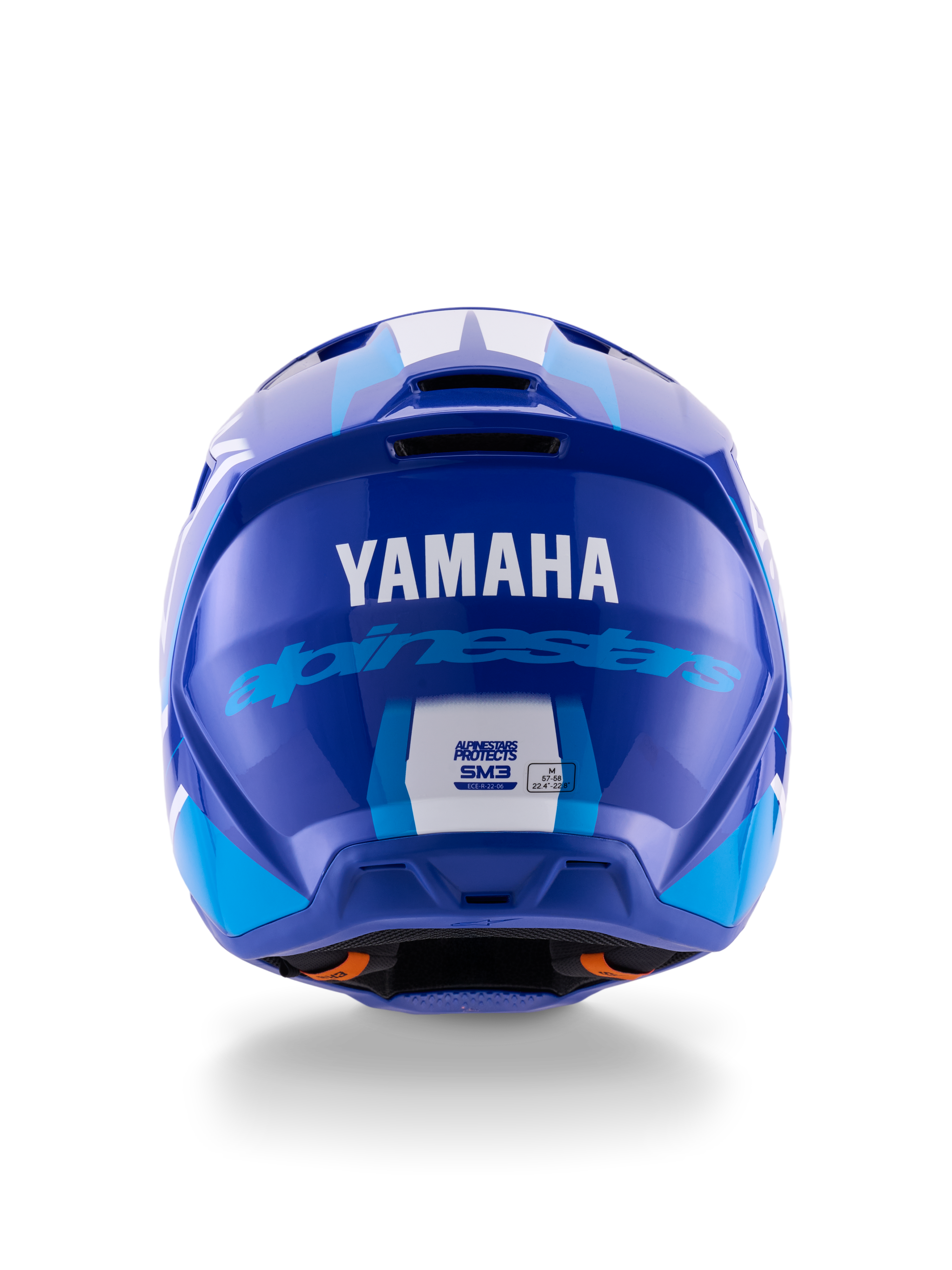 Alpinestars Yamaha S-M3 hjelm, motocrosshjelm, blå hvid blank, set bagfra med hvidt YAMAHA-logo og blå Alpinestars-skrift, elegant blank finish med synlige ventilationsåbninger og sikkerhedscertificeringsmærkater.