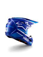 Alpinestars Yamaha S-M3 motocrosshjelm til unge, blå og hvid blank, med tydelig Yamaha-branding på siden og bagpå, aerodynamisk skaldesign med bagventilation, ungdomsspecifik hovedbeskyttelse til off-road, trekvart profil bagfra