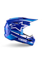 Yamaha S-M3 motocrosshjelm til unge, blå og hvid blank, sideprofil med markant Yamaha-branding og Alpinestars-stjernelogo, geometrisk design med lyseblå detaljer, ventileret skal med langt visir, ECE 22.06-certificeret off-road hovedbeskyttelse