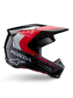 Honda S-M5 hjelm, motocross-hjelm, blank sort og rød med hvide og sølvfarvede detaljer, set fra siden med Honda- og Alpinestars-logoer, aerodynamisk design med visir og flere ventilationsåbninger, professionelt beskyttelsesudstyr til off-road