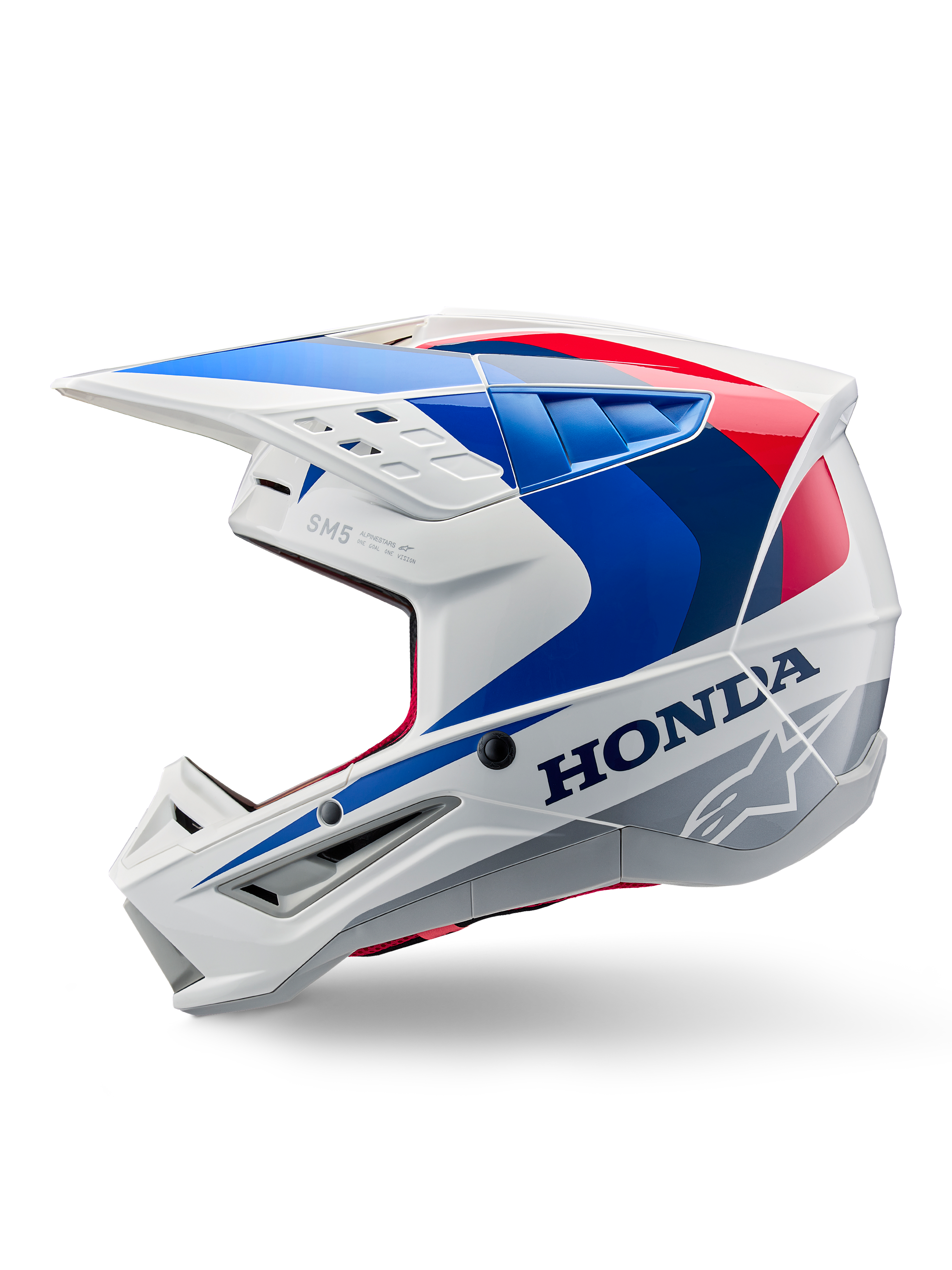 Alpinestars Honda S-M5 hjelm ECE, hvid blå rød blank, set fra siden, med tydelig Honda-branding og Alpinestars stjernelogo, aerodynamisk motocross-design med flere ventilationsåbninger og en markant skygge, blank finish