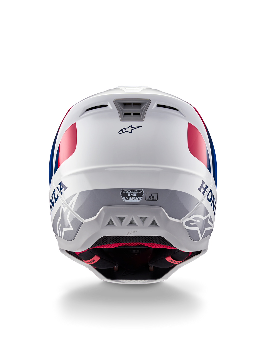 Alpinestars Honda S-M5 hjelm ECE, motocrosshjelm, blank hvid, blå og rød, set bagfra med Honda- og Alpinestars-branding, strømlinet skal med integrerede udstødningsporte og ECE-certificeringsmærkat.