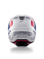 Alpinestars Honda S-M5 hjelm ECE, motocrosshjelm, blank hvid, blå og rød, set bagfra med Honda- og Alpinestars-branding, strømlinet skal med integrerede udstødningsporte og ECE-certificeringsmærkat.