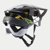 The Vector Tech Pilot Helmet CE, crafted by Alpinestars EU, boasts a sleek multicolored design featuring black, yellow fluo, and red glossy sections. The helmet is designed with ventilation openings and an adjustable strap system to ensure rider protection. Enhanced safety is provided through MIPS technology, while the brand name "Alpinestars" is prominently displayed on the side. The background is white.