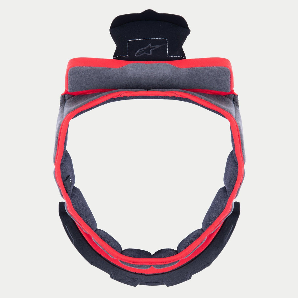 Alpinestars Supertech R10 kronepude, indvendig udskiftningspolstring til hjelm, gråt blødt stof med rød kant og sorte monteringsfaner, cirkulært design til S-R10 hjelme, med broderet stjernelogo på den øverste fane.