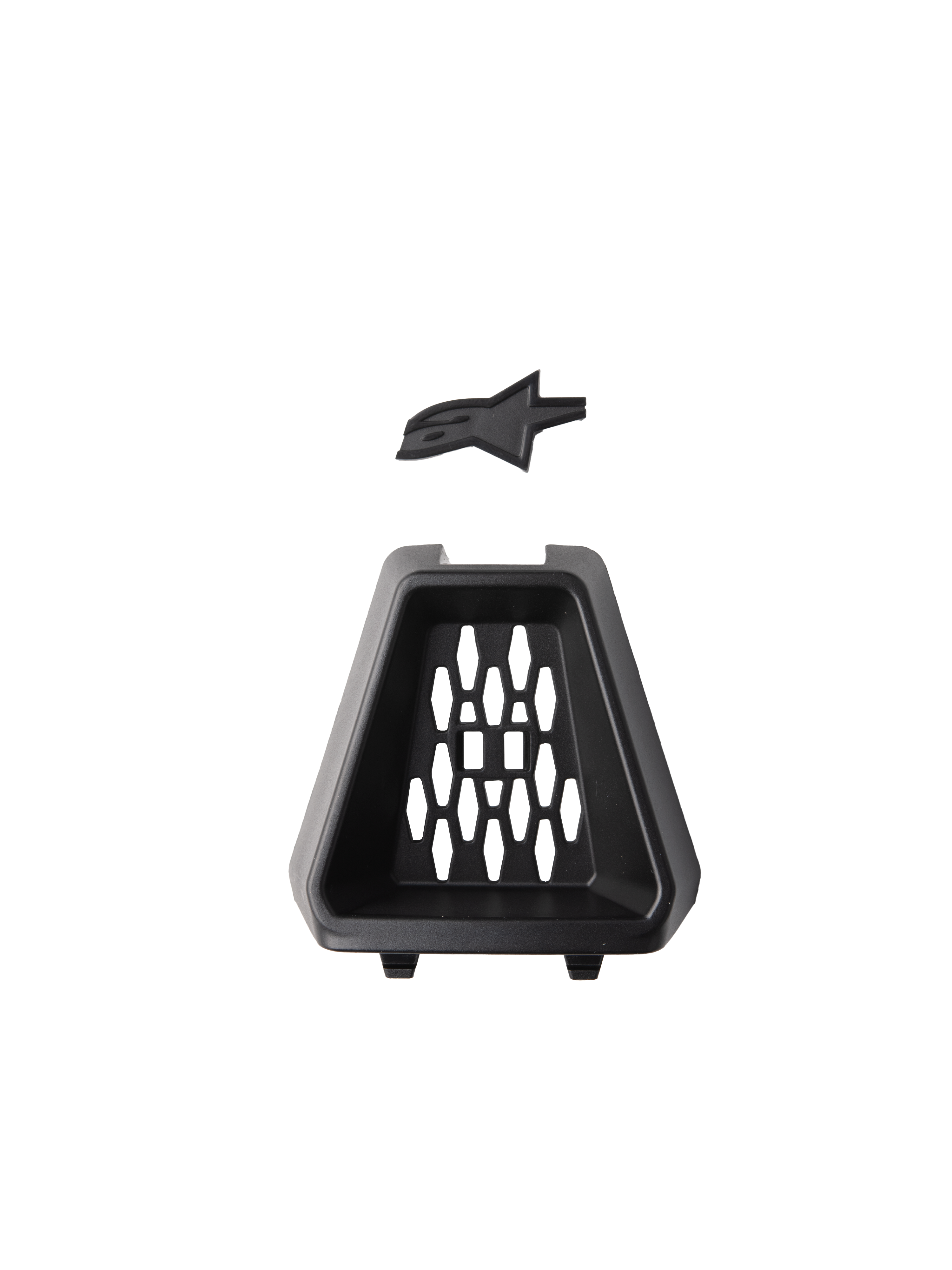 Alpinestars S-M3 Chin Vent, Helmet Accessory, Black, official replacement part featuring a trapezoidal plastic vent with a honeycomb pattern and a separate black Astars logo insert, designed for off-road motorcycle helmets.