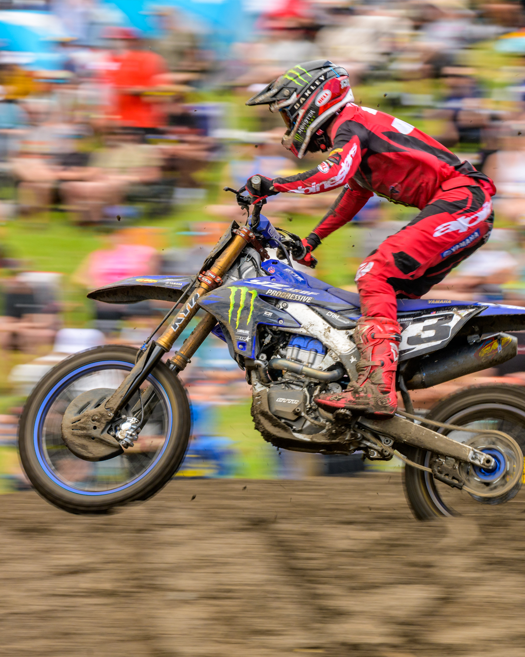 Eli Tomac racing through the frame