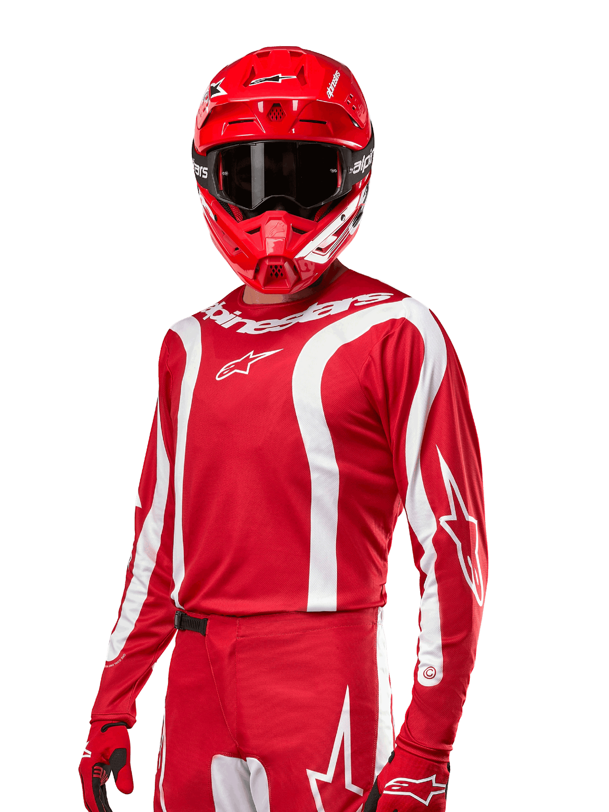 Alpinestars 2024 Fluid Lurv trøje, motocross racing trøje, Mars Red og hvid, båret med matchende rød hjelm og handsker, markant sporty design med hvide buede striber og Alpinestars-branding