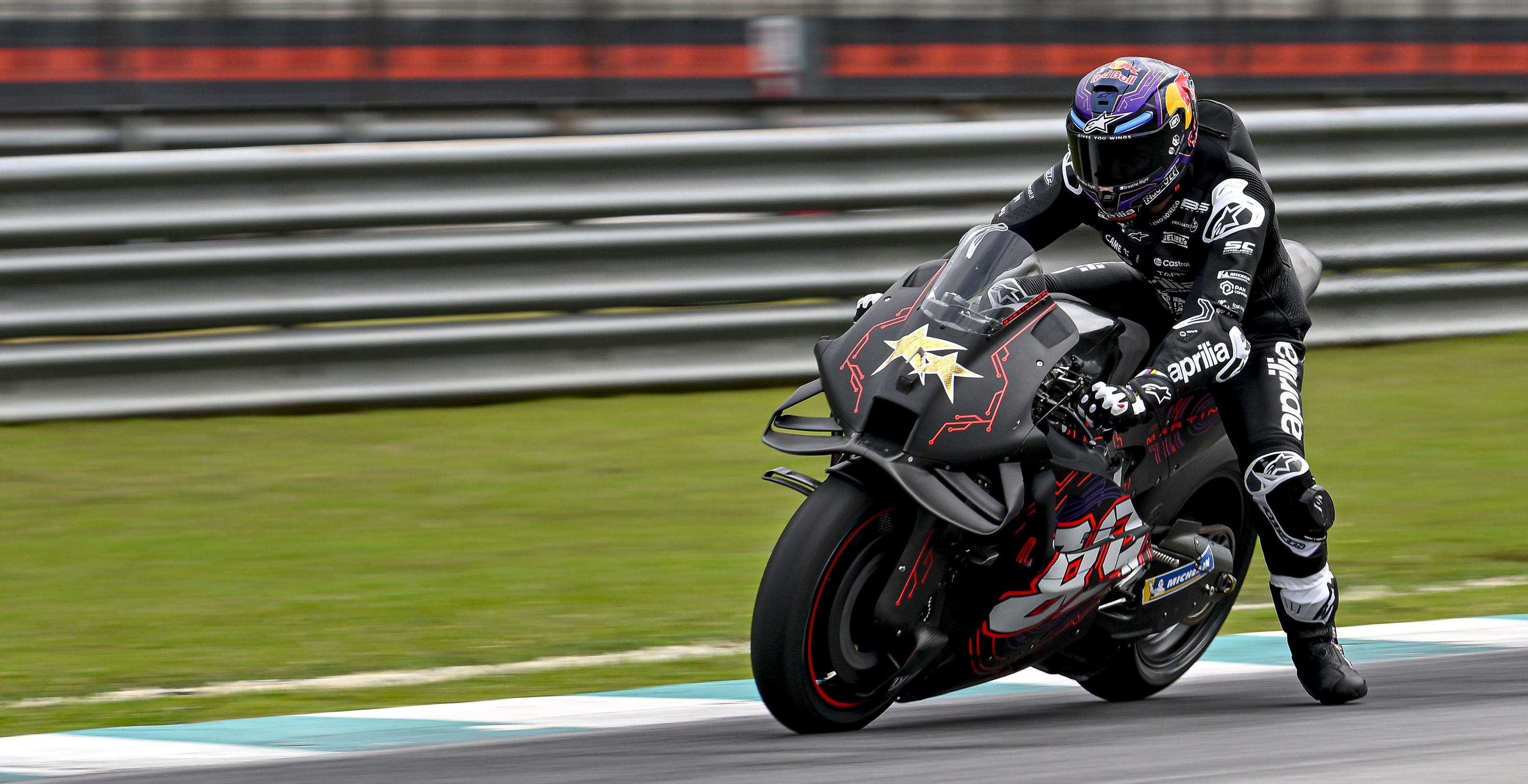 Jorge Martin on the track wearing the Supertech R10 helmet and full Alpinestars gear