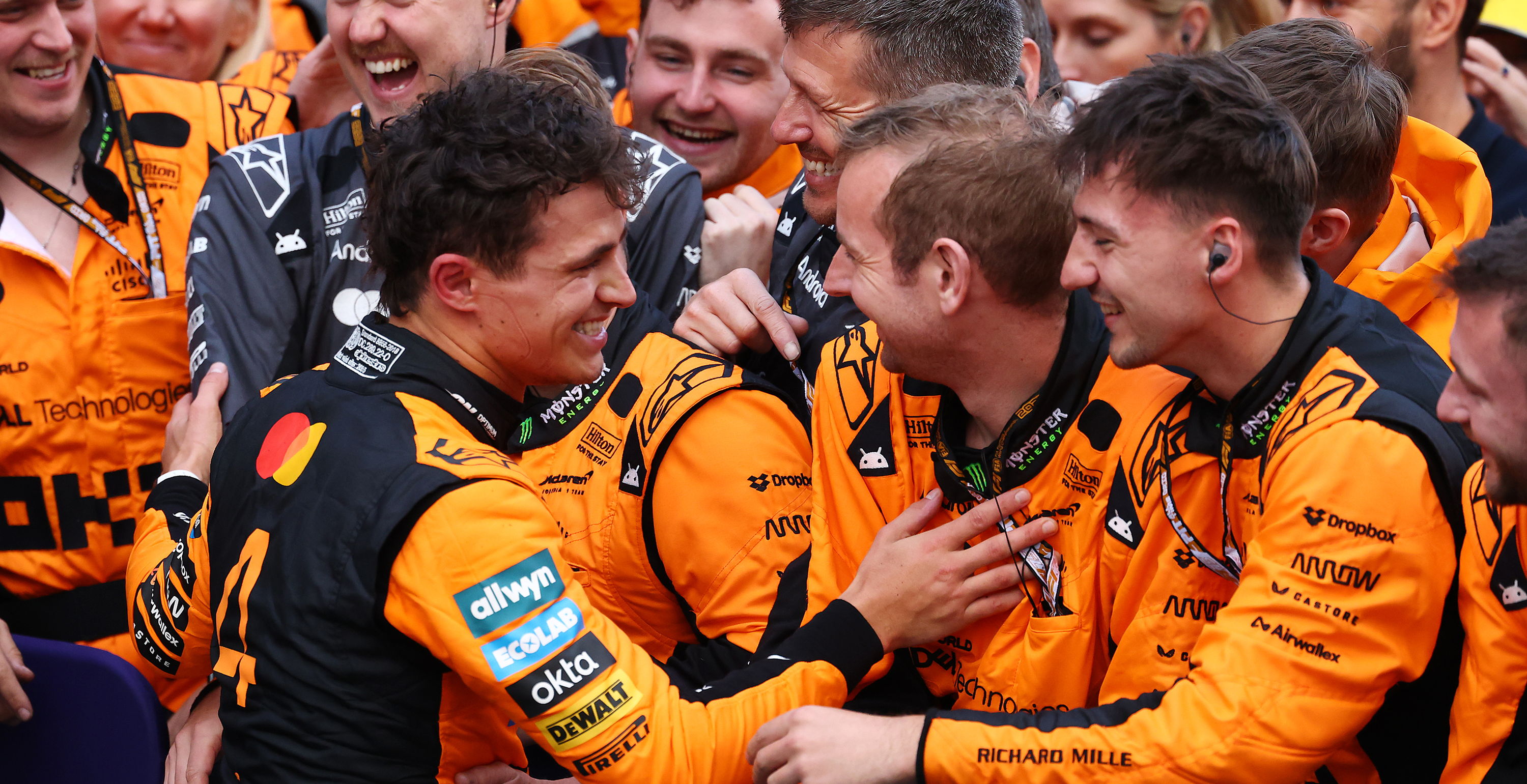 Lando Norris celebrating a victory with the team