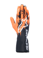 Alpinestars Tech-1 K V3 Gloves, Karting Gloves, Black Orange and White, featuring a sublimated graphic design with orange brush-stroke patterns on a black base, large white Astar logo on the back, vertical Alpinestars text on the gauntlet cuff, professional kart racing gear