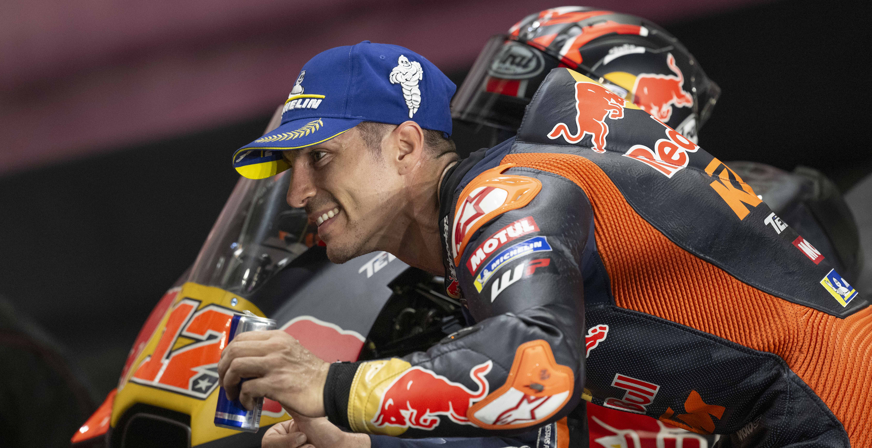Vinales wearing Alpinestars suit and drinking a RedBull