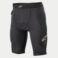 Alpinestars Youth Paragon Lite beskyttelsesshorts, cykelbeskyttelsesshorts, sort, med åndbart mesh-stof, integreret hoftepolstring, hvidt Alpinestars-logo på linningen og siden af benet, letvægts beskyttende undershorts til MTB