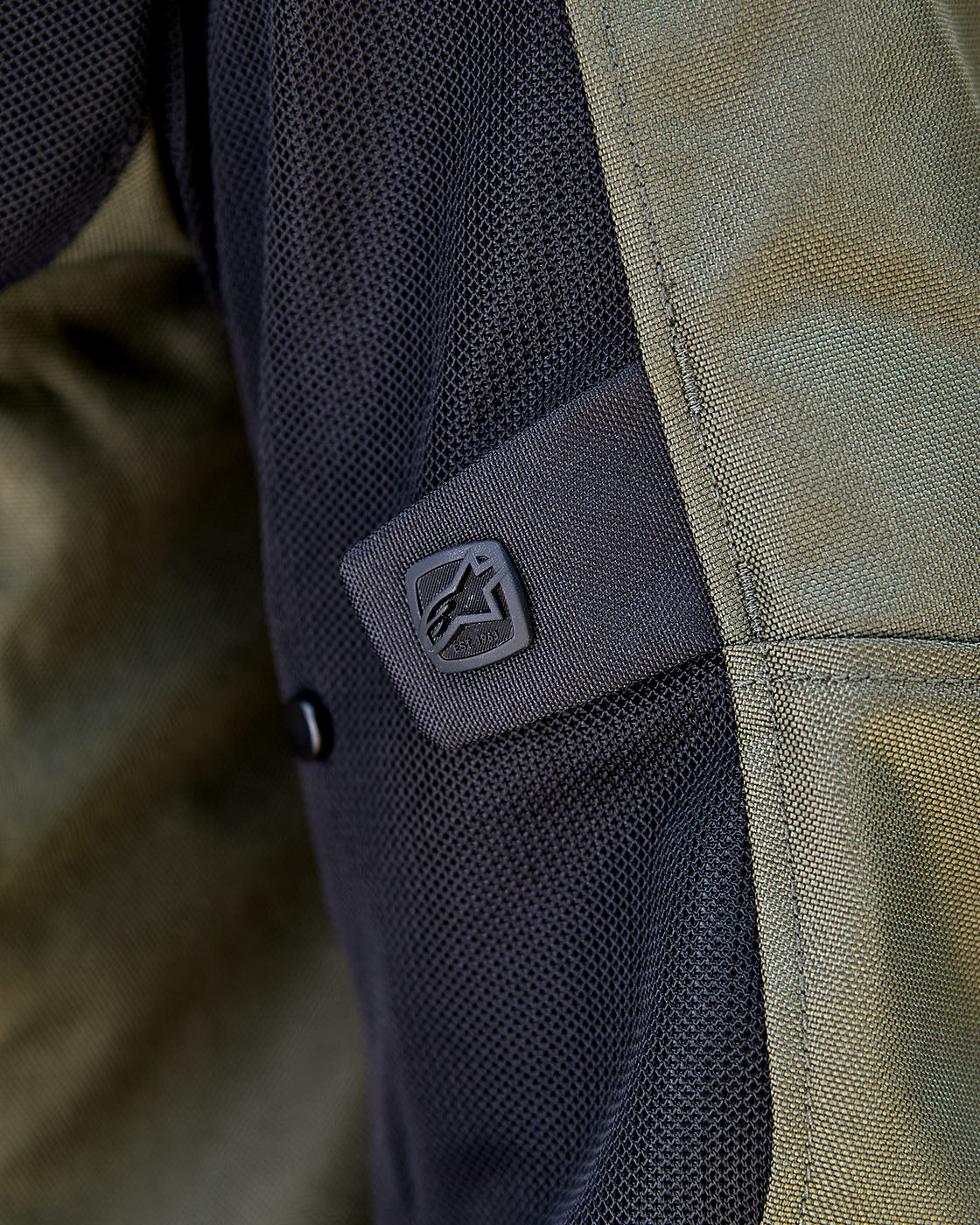 Alpinestars C-1 Air Jacket, Urban Motorcycle Jacket, Olive Green and Black Tech Mesh with a branded button sleeve adjuster tab.