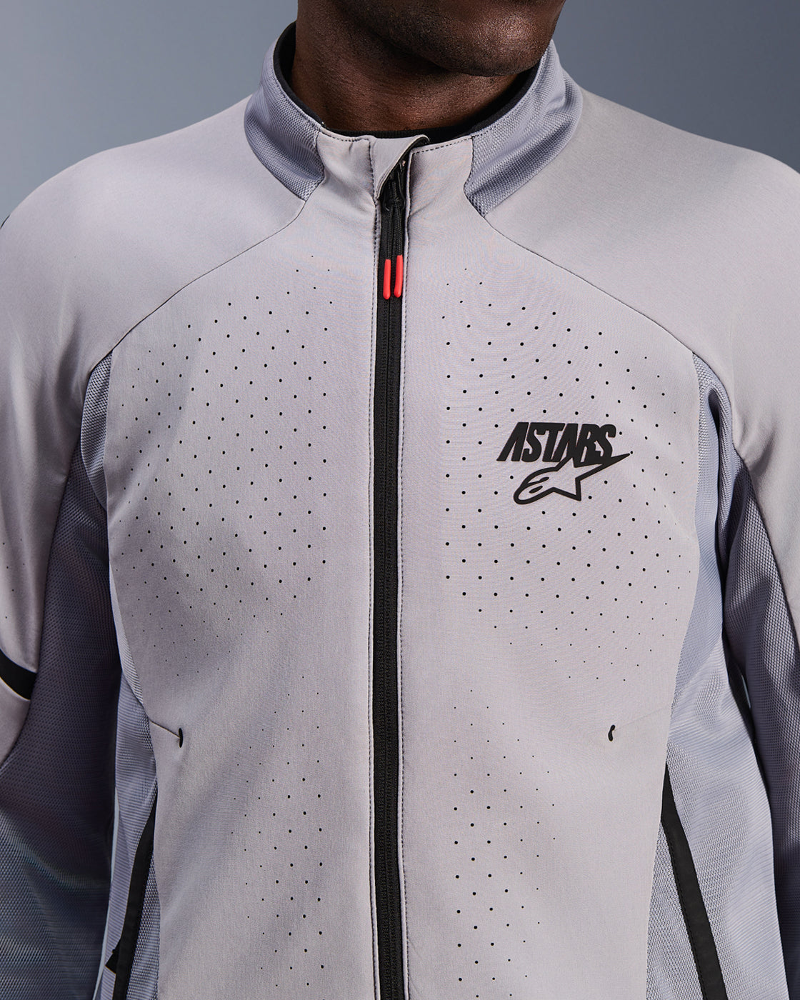 Alpinestars Aeroshell Airflow Jacket, gray and black textile motorcycle jacket with laser perforations for road racing.